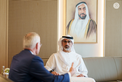 Khaled bin Mohamed bin Zayed receives ExxonMobil Chairman and CEO Darren Woods