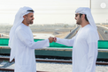 Maktoum bin Mohammed bin Rashid and Theyab bin Mohamed bin Zayed witness the connection of Abu Dhabi and Dubai with a direct railway within the “UAE National Rail Network”