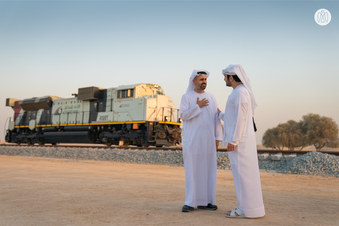 Maktoum bin Mohammed bin Rashid and Theyab bin Mohamed bin Zayed witness the connection of Abu Dhabi and Dubai with a direct railway within the “UAE National Rail Network”