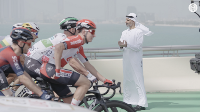 Khaled bin Mohamed bin Zayed greets cyclists starting stage two of the UAE Tour from Abu Dhabi’s Hudayriyat Island