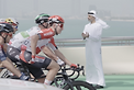 Khaled bin Mohamed bin Zayed greets cyclists starting stage two of the UAE Tour from Abu Dhabi’s Hudayriyat Island