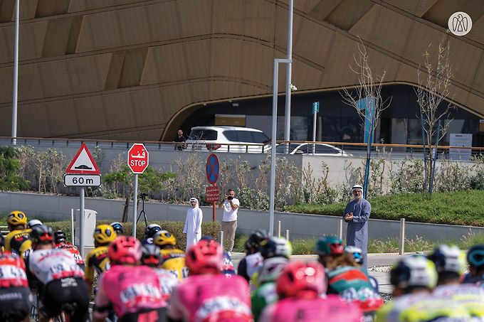 Khaled bin Mohamed bin Zayed greets cyclists participating in Stage 6 of UAE Tour 2023