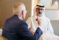 Khaled bin Mohamed bin Zayed receives ExxonMobil Chairman and CEO Darren Woods