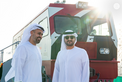 Maktoum bin Mohammed bin Rashid and Theyab bin Mohamed bin Zayed witness the connection of Abu Dhabi and Dubai with a direct railway within the “UAE National Rail Network”