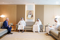 Khaled bin Mohamed bin Zayed receives ExxonMobil Chairman and CEO Darren Woods