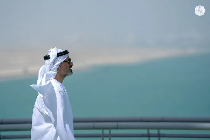Khaled bin Mohamed bin Zayed greets cyclists starting stage two of the UAE Tour from Abu Dhabi’s Hudayriyat Island