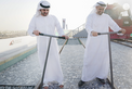 Maktoum bin Mohammed bin Rashid and Theyab bin Mohamed bin Zayed witness the connection of Abu Dhabi and Dubai with a direct railway within the “UAE National Rail Network”