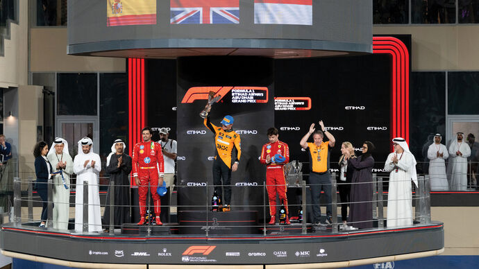 Hamdan bin Mohamed bin Zayed presents Lando Norris with Formula 1 Etihad Airways Abu Dhabi Grand Prix winner’s trophy