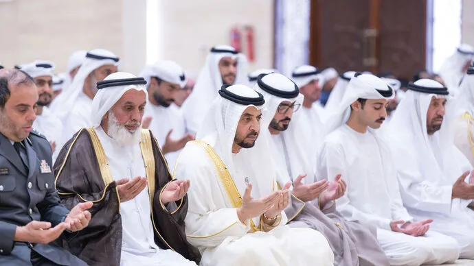 Hamdan bin Zayed performs Eid Al Fitr prayer at Mohammed Al Falahi Al Yasi Mosque in Al Mirfa and receives well-wishers
