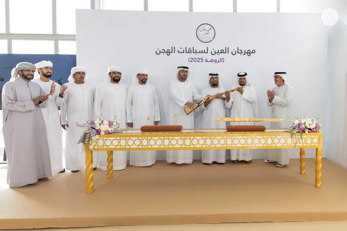 Rashid bin Hamdan bin Mohammed and Mohammed bin Hamdan bin Zayed  award winners of Romooz category race in final round of Al Ain Camel Racing Festival 2025