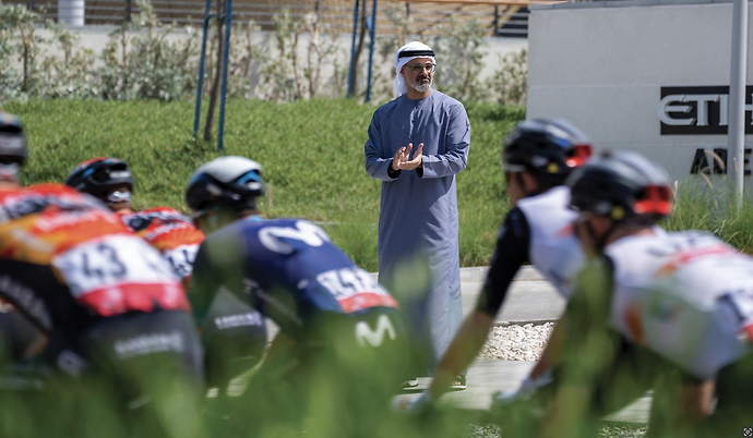 Khaled bin Mohamed bin Zayed greets cyclists participating in Stage 6 of UAE Tour 2023